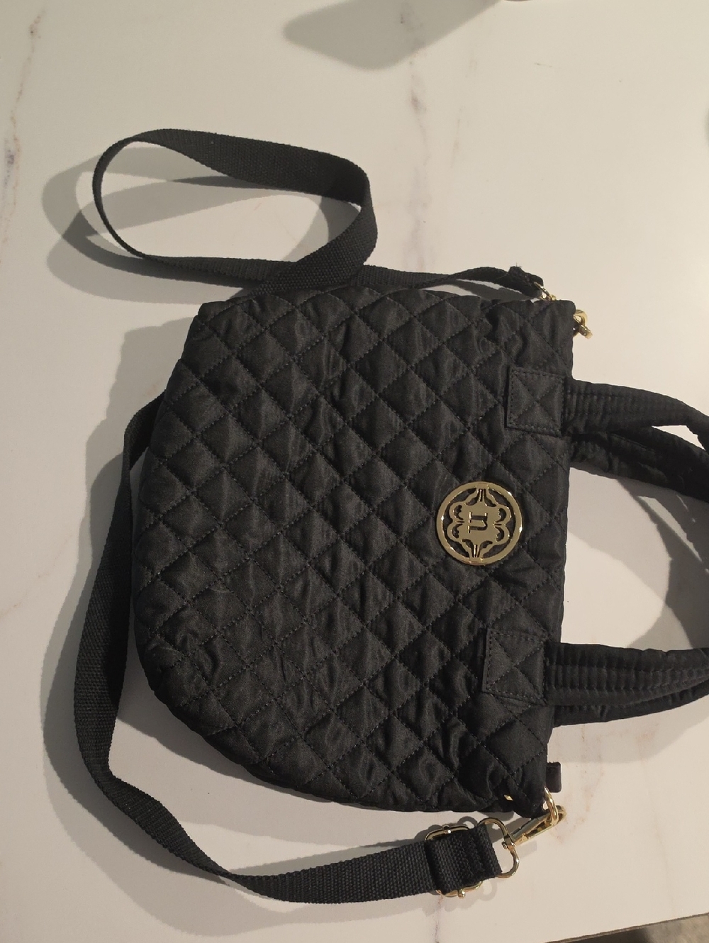 nanette Lepore Black Quilted Handbag with Gold Emblem